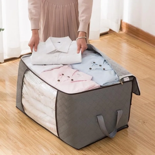 Foldable clothes organizer bag with waterproof Oxford material, clear window, and non-woven storage. Ideal for wardrobe organization at home.
