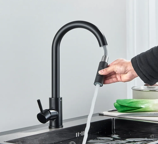 Deck mounted black kitchen faucet with a single handle, featuring two functions for hot and cold water, and a pull-out mixer design