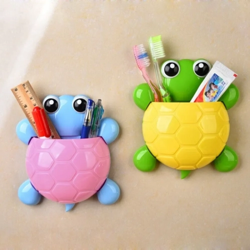 Adorable tortoise-shaped toothpaste rack with a strong suction cup, plastic toothbrush holder for bathroom wall mounting.