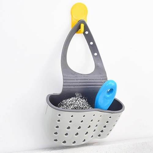 Adjustable kitchen sink organizer for soap, sponges, and tools. Hanging drain basket for efficient storage.