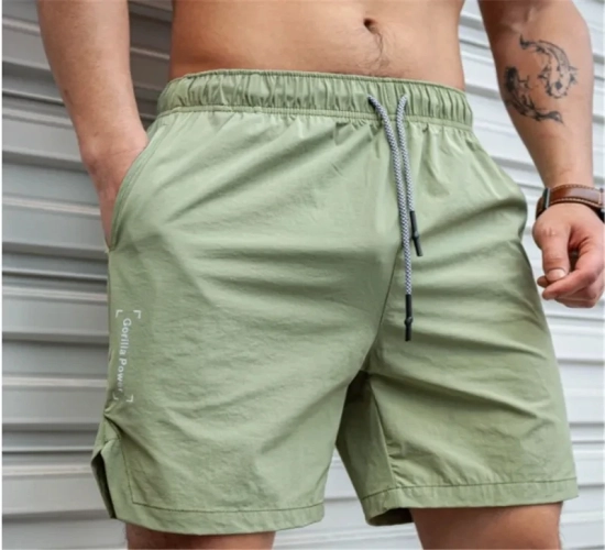Stay Cool During Your Workouts with Men's Hot Shorts: Lightweight and Thin for Running, Squats, and Fitness. These Quick-Drying Drawstring Shorts are Ideal for GYM Wear, Offering Comfort and Style