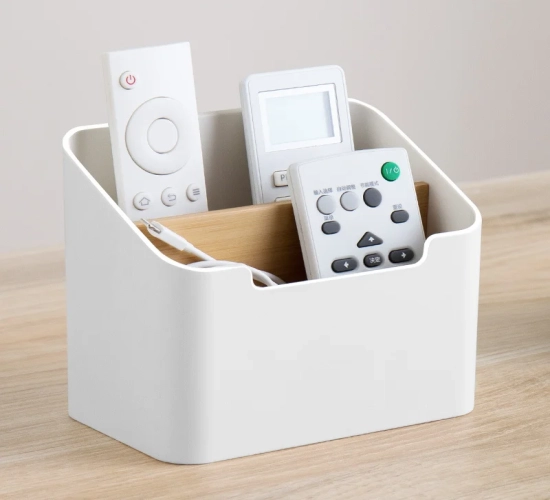 Versatile organizer for TV, air conditioner remote controls. Practical storage box also serves as a tissue box and home cosmetic organizer.
