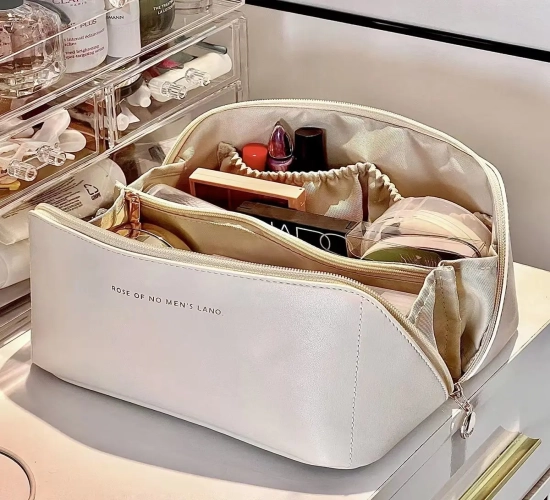 Spacious PU Leather Cosmetic Travel Bag: High-Capacity Organizer Pouch for Women, Ideal for Makeup Storage.