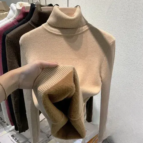 Stay cozy in this plush-lined winter turtleneck sweater for women. Slim fit, long sleeves, soft knit—perfect for a warm and stylish Korean basic pullover.