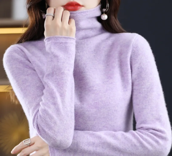 Stay warm and stylish in this high-quality Merino Wool Cashmere sweater for women. Long sleeves, high stacked collar, perfect for winter.