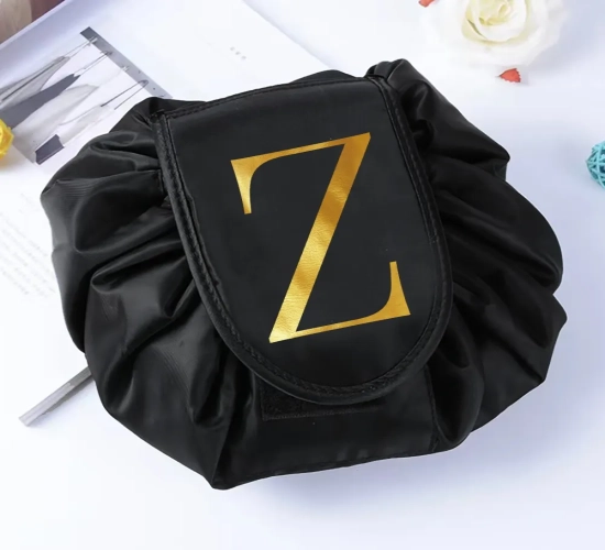 Effortless Cosmetic Storage Solution Portable Magic Pouch for Women, Folding Makeup Bag with Letter Print. Convenient Travel Organizer and Wash Bag for Toiletries.