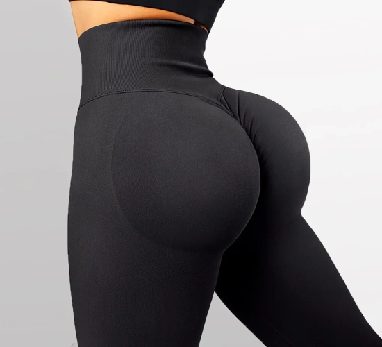 High Waist and Hips Tight Design, accentuating the Peach Buttocks. These High Waist Nude Yoga Pants offer both style and comfort for your fitness sessions.