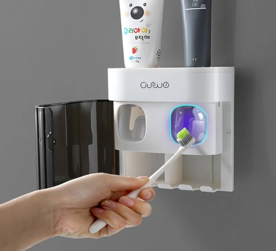 Wall-Mounted Automatic Toothpaste Dispenser and Toothbrush Draining Storage Rack - Dust-Proof, Convenient Toothpaste Squeezer, and Stylish Bathroom Accessory.