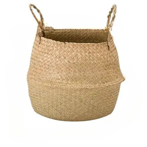 Wicker planter and storage basket for flowers, laundry, or decoration. Made of rattan, perfect for household organization.